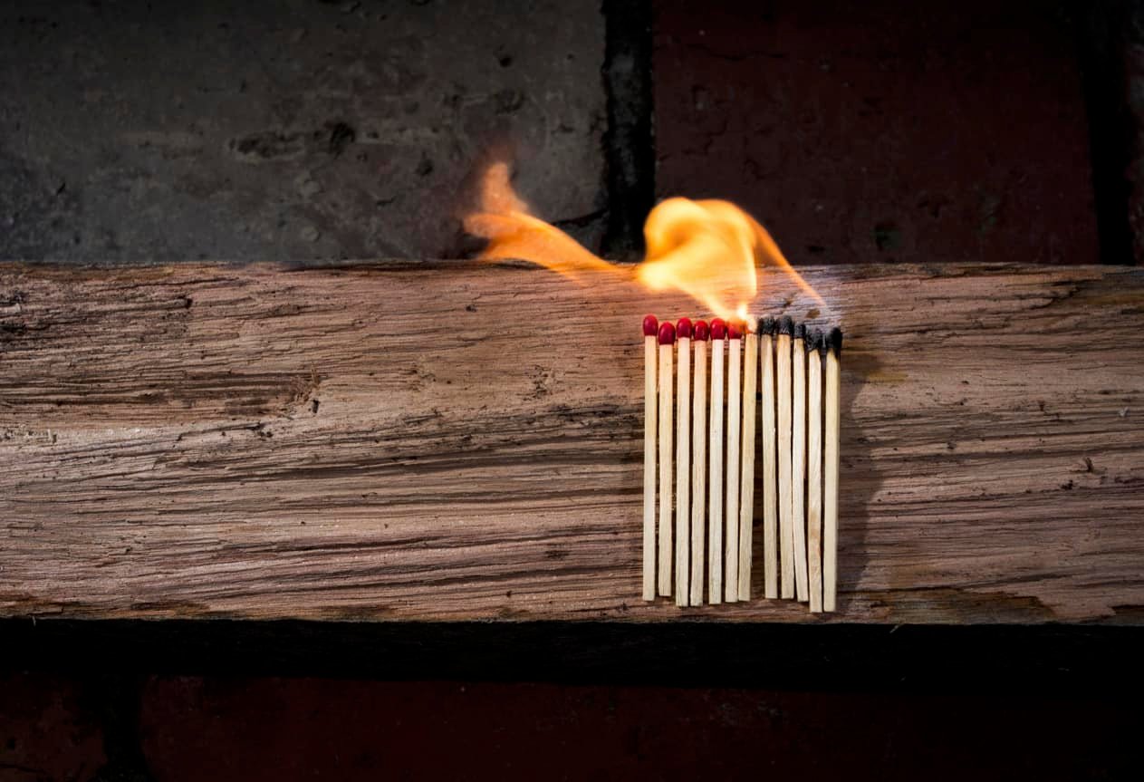 row of burning matches