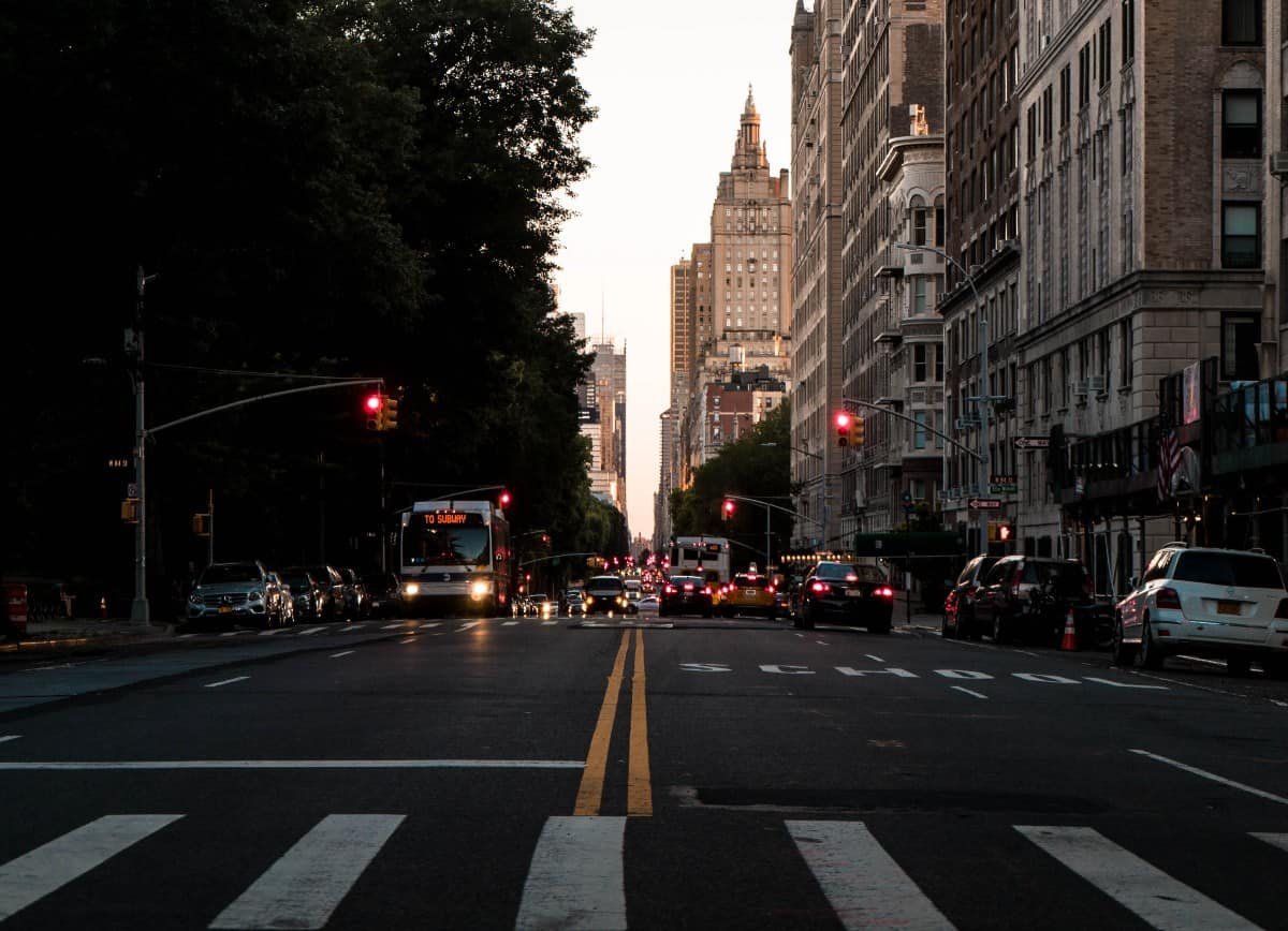 Red traffic lights on a busy street.